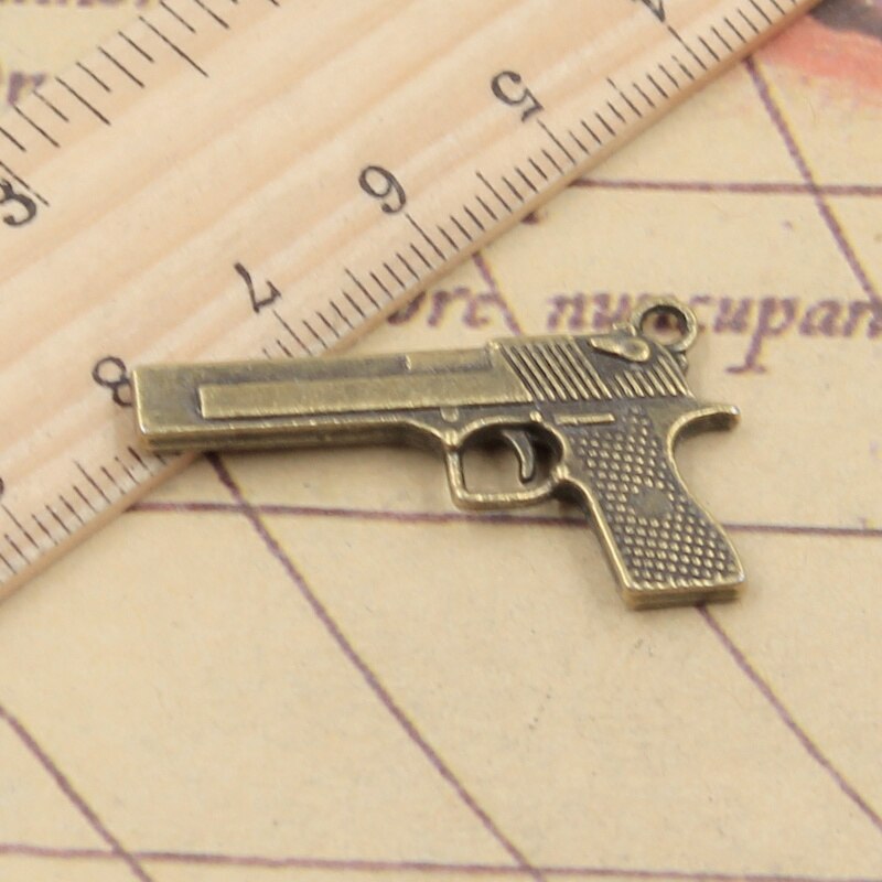 DIY Handmade Jewelry: 56 Antique Bronze Plated Zinc Alloy Crossbow Bow Gold  Nomination Charms In 20mm Size From Zhoufangyu5, $7.22