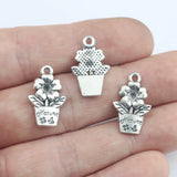 Lote de 20 abalorios de flores de color plata antigua de 13x20 mm con forma de plantas en maceta, ideales para collares, pulseras y joyas.