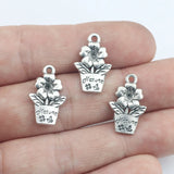 Lote de 20 abalorios de flores de color plata antigua de 13x20 mm con forma de plantas en maceta, ideales para collares, pulseras y joyas.