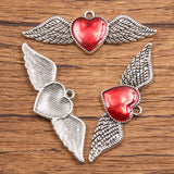 11 European and American cross-border personality retro gothic peach heart wings alloy earrings necklace jewellery accessories