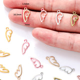 100pc 17 * 7mm alloy accessory with hollowed out wings and wing pendant D453