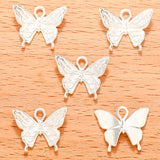 50 piezas de 18 x 15 mm, accesorio de joyería de aleación para bricolaje, colgante de mariposa D2137 