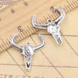 20 piezas dijes Yak cráneo toro cabeza de buey 25x23mm colgantes de Color plata tibetana fabricación de joyería antigua DIY artesanía hecha a mano
