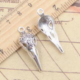 Dijes de piezas para fabricación de joyas, colgantes de Color plata tibetana, Calavera, pico, esqueleto, pájaro, 35x13mm, fabricación de joyas antiguas, artesanía hecha a mano, 10 unidades