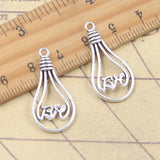 20 piezas dijes bombilla de lámpara 28x14mm colgantes de Color plata antigua fabricación DIY joyería tibetana hecha a mano