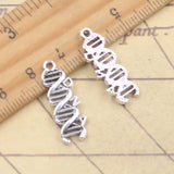 20 piezas dijes de ácido déoxribonucleico espiral ADN 25x9mm colgantes de Color plata antigua para hacer joyería tibetana hecha a mano DIY