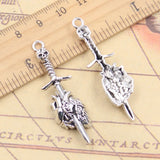 Colgantes de plata tibetana de 49x14mm con forma de Calavera, espada, corazón perforado, fabricación de joyas antiguas, artesanía hecha a mano, 10 piezas