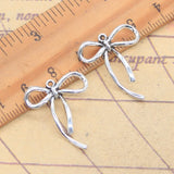 20 piezas dijes lazo 25x21mm colgantes de Color plata antigua para hacer joyería tibetana hecha a mano DIY