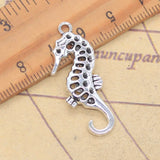 10 Uds. De dijes de caballito de mar, hipocampo, 35x14mm, colgantes de Color plata antigua, fabricación de joyería tibetana hecha a mano DIY