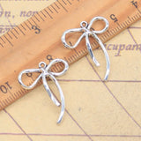 20 piezas dijes lazo 25x21mm colgantes de Color plata antigua para hacer joyería tibetana hecha a mano DIY