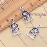 20 piezas dijes flor de girasol 18x10mm colgantes de Color plata antigua para hacer joyería tibetana hecha a mano DIY