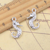 10 Uds. De dijes de caballito de mar, hipocampo de océano, 22x15mm, colgantes de Color plata antigua, fabricación de joyería tibetana hecha a mano DIY