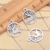 30 Uds. Colgantes de Navidad, copo de nieve, ciervo, alce de nieve, 18x15mm, colgantes de Color plata antigua, fabricación DIY, joyería tibetana hecha a mano