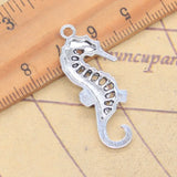 10 Uds. De dijes de caballito de mar, hipocampo, 35x14mm, colgantes de Color plata antigua, fabricación de joyería tibetana hecha a mano DIY