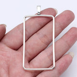 Marcos de pegamento geométricos huecos de color plata antigua, 10 unidades, 69 x 33 x 2 mm, rectangulares, para fabricación de joyas.