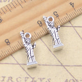 10 Uds. De dijes de Estatua de la libertad de Nueva York, 21x7x6mm, colgantes de Color plata antigua, fabricación tibetana, joyería artesanal hecha a mano DIY