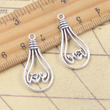 20 piezas dijes bombilla de lámpara 28x14mm colgantes de Color plata antigua fabricación DIY joyería tibetana hecha a mano