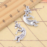 20 piezas dijes Kokopelli nativo 26x13mm colgantes de Color plata antigua para hacer joyería tibetana hecha a mano DIY