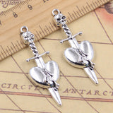 Colgantes de plata tibetana de 49x14mm con forma de Calavera, espada, corazón perforado, fabricación de joyas antiguas, artesanía hecha a mano, 10 piezas