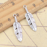20 piezas dijes hoja de plumas 29x8mm colgantes de Color plata tibetana fabricación de joyería antigua artesanía hecha a mano DIY