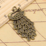 Dijes de piezas para fabricación de joyas, colgantes de Color bronce tibetano, plata, ave, pavo real, Fénix, 44x22mm, fabricación de joyas antiguas, artesanía hecha a mano, 10 unidades