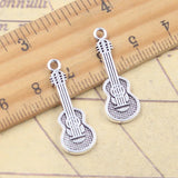 20 piezas dijes instrumento Musical violín guitarra 27x10mm colgantes de Color plata antigua fabricación DIY joyería tibetana hecha a mano