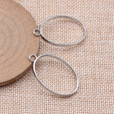 10pcs 23x39x3.6mm 3 Colors Hollow Geometric Glue Frame Series Elliptical Border Oval Frame For Jewelry Making Findings