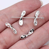 40 cuentas de pajarita martilladas de color plata antigua de 21,5 x 5 x 4,7 mm/15,8 x 5 x 4,2 mm con agujeros pequeños para hacer joyas.