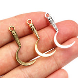 20 colgantes WYSIWYG de 11 x 30 mm con forma de guadaña de calavera en color plata antigua para hacer joyas hechas a mano.