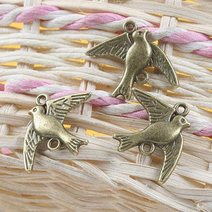 14pcs antiqued bronze flying bird design pendant G661