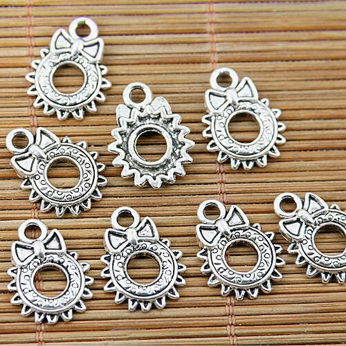 20pcs Tibetan silver tone round sun bowknot charms EF1643