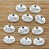 Assorted tibetan silver tone family lettering oval shaped charms to pick