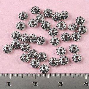 220pcs Tibetan Silver Gyrate Beads H0502