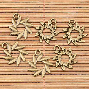 28pcs antiqued bronze tone swirled leaf  round charms h3776