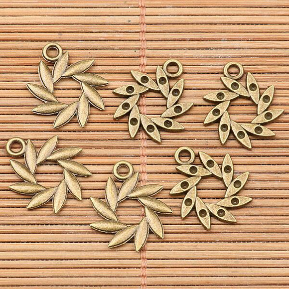 28pcs antiqued bronze tone swirled leaf  round charms h3776