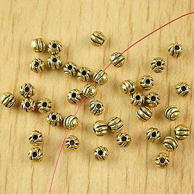 100pcs dark gold-tone little round spacer beads h2311