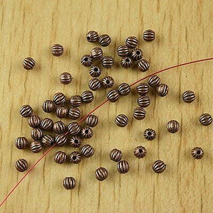 100pcs  copper-tone little round spacer beads h2363