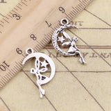 20 piezas de dijes de hada, ángel, luna y estrella, 25 x 14 mm, tibetano, bricolaje, joyería retro, pulsera, collar, colgante de color bronce antiguo y plata. 