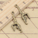 20 piezas de dijes de gimnasta deportista, 30 x 11 mm, colgantes de bronce tibetano color plata, joyería antigua, artesanía hecha a mano. 