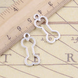 20pcs Charms Hollow Dog Bone 25x11mm Tibetan Bronze Silver Color Pendants Antique Jewelry Making DIY Handmade Craft