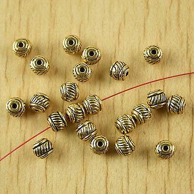 50pcs dark gold-tone diagonal round spacer beads h2086