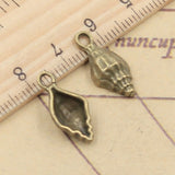 30 piezas de dijes de concha de caracola de 19 x 9 mm, colgantes de color plata y bronce tibetano, joyería antigua, fabricación de bricolaje, colgante artesanal hecho a mano. 