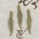 30pcs Charms Double Sided Feather 31x6mm Antique Bronze Silver Color Pendants DIY Craft Making Findings Handmade Tibetan Jewelry EF3754
