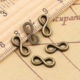30 piezas de dijes con símbolo de infinito, conectores de 12 x 5 mm, colgantes de color bronce tibetano y plata, fabricación antigua, manualidades hechas a mano. 