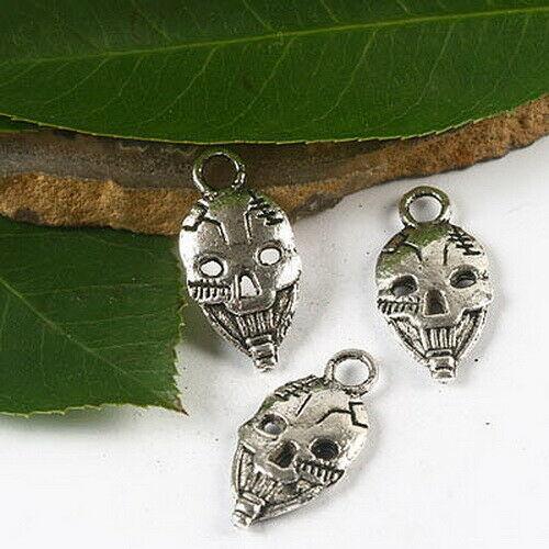 15pcs Tibetan silver color skull face charms h2438