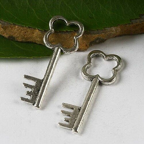 12pcs Tibetan silver oval flower key charms h2969