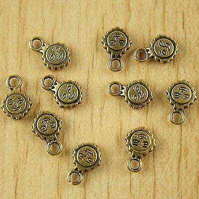 40pc dark gold-tone 2sided serrated face charms h2063