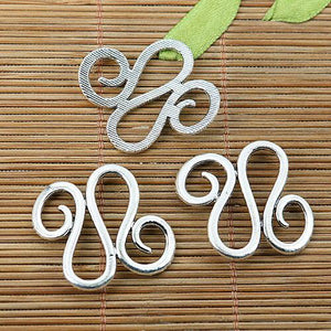 7pcs Tibetan silver color curved special swirl fingdings EF1806