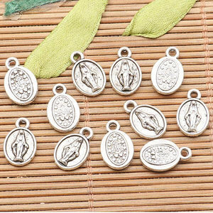 50pcs tibetan silver color religious portrait design charms H1058
