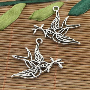 12pcs Tibetan silver two sides hollow peace bird pendant h5064